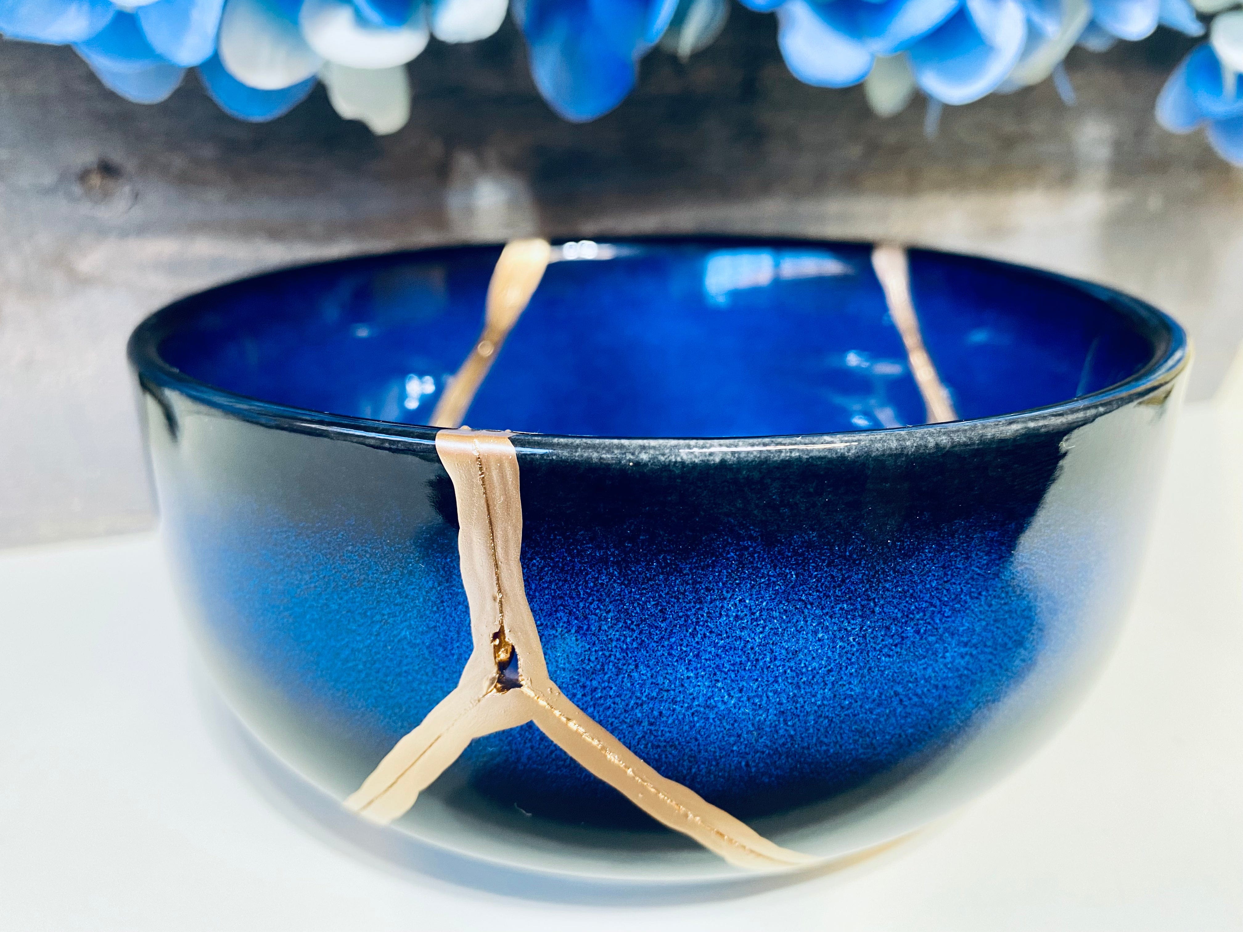 Kintsugi Blue Bowl Repaired With Gold Stock Photo - Download Image